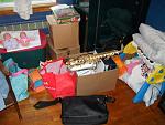 The mess of my room, littered with my niece's stuff, my laptop bag, and my white Alto Sax