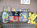Full view of 3/4 of my Pokemon stuff on my couch.