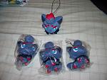 Four miniature Zorua plushies