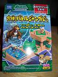 Gattai! Battle Jungle Game. Collect the different pieces, connect them, and play. The included piece is Heracross.