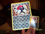 Jumbo Zoroark card and normal Zoroark card