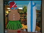 The sand man, snow man made of sand
The snowman, crab and the ground was done by my cousin and her ex-boyfriend. I did the surf board

This in the front window of my dads office