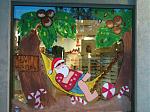 Santa on Vacay
My mom, sister, and I worked on this one, I as put incharge of the palm trees, so that is what I painted

This in the front window of my dads office