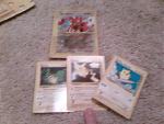 A Giant Scizor card(got from a 7-11 that my parents were at, they saw a guy throwing the cards out and asked for one), and 3 promo Pikachu cards.