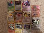 Rare cards/cards I treasure above the others
Yes, I know the ancient mew is destroyed, but I got it from someone else that didn't care as much.
top left to bottom right:
Tangrowth Lv.X, Delta Spieces Umbreon, Gengar Lv.X, Ancient Mew, Delta Species Pidgeot, Delta Spieces Mewtwo, Dragonite Ex, 2 Fire Arceus, Electric Arceus, Normal Promo Arceus, Arceus Lv. X