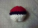 Knitted Pokeball.  A little misshaped...but otherwise not bad for my first one.