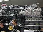 A Pokemon store filled with plushies and T-Shirts.