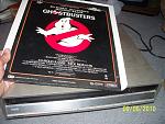 This is the movie Ghostbusters on a CED (Capacitance Electronic Disc) along with the player. Bet you've never seen one of these before.