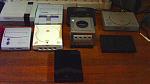 All my home consoles, lined up in chronological order, and congregated in the middle of my bedroom floor. X3
